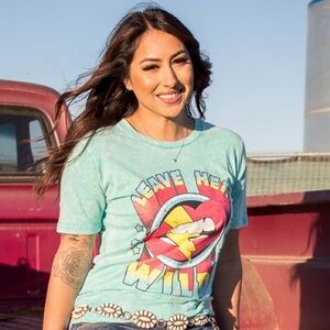 Turquoise “leave her wild” tee